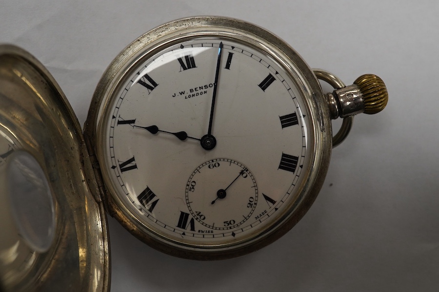 A George V silver J.W. Benson keyless half hunter pocket watch, with Roman dial and subsidiary seconds, case diameter 49mm. Condition - poor to fair